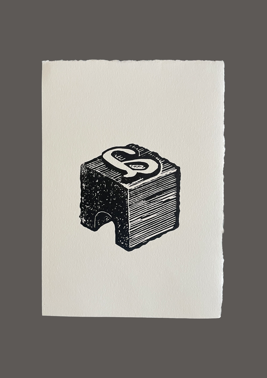 Linogravure d’un caractère mobile, lettre a bas de casse